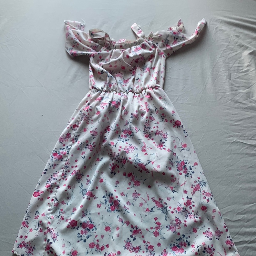 This piece is a jumper with built in shorts and a long skirt